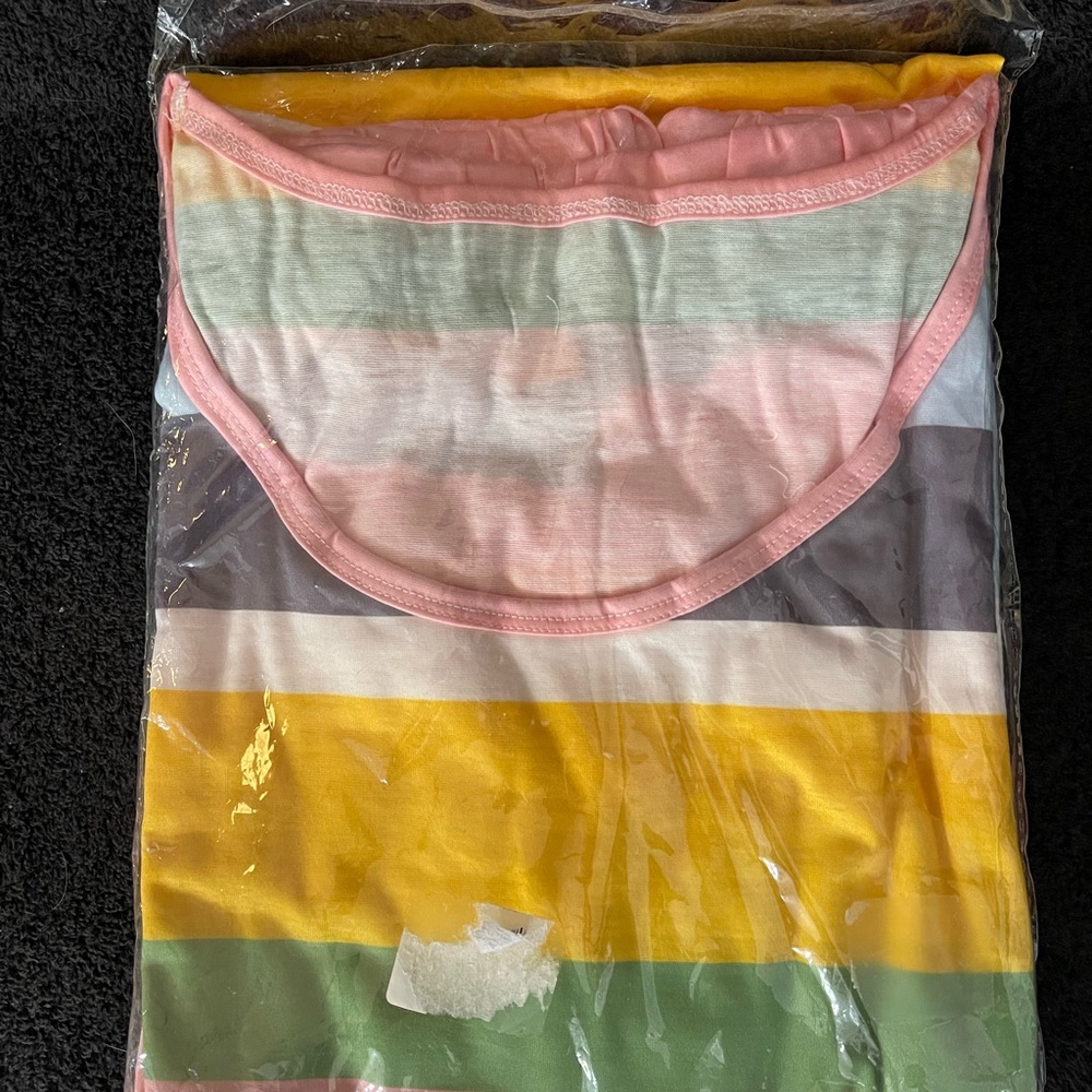 Brand new. 2X Striped Pajamas. Bust is 44 inches and length is 26 inches. - Picture 2 of 5